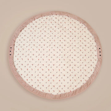 MiniDream 2-in-1 baby pink playmat laid flat, featuring a cream patterned interior and a solid pink border.