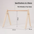 A product dimension diagram showing the wooden play frame with overlaid text and arrows indicating a length of 63 cm, an assembled height of 42 cm, and a base width of 49 cm.