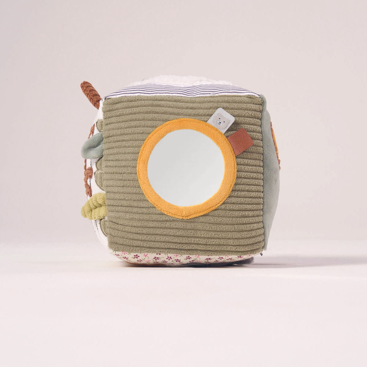 Top-angled view of the lightweight MiniDream Soft Activity Cube emphasizing the round, baby-safe mirror designed for early self-recognition.