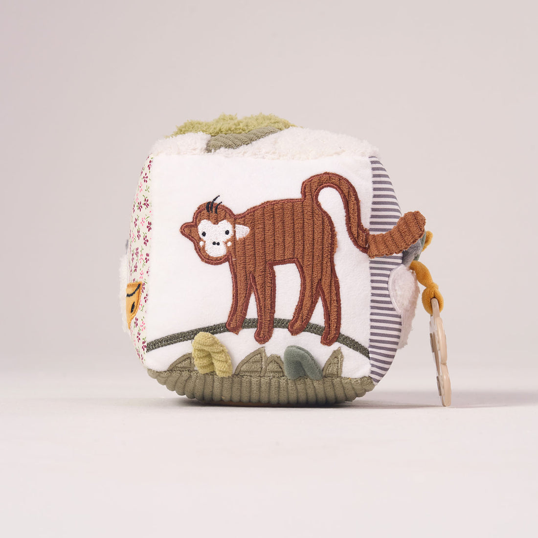 Main view of the MiniDream Jungle Soft Activity Cube for babies, featuring a plush lion face, a top mirror, and an attached soothing teether ring.