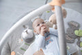 Baby enjoying musical play mat designed for developmental growth.