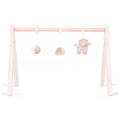 MiniDream wooden activity gym with hanging toys in a white background